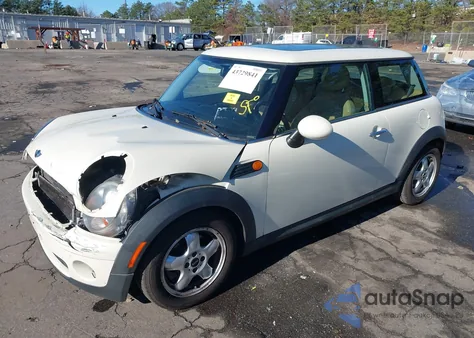 2010 Mini Cooper z USA, uszkodzony, nr VIN WMWMF3C56ATZ65306